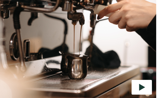 barista making espresso