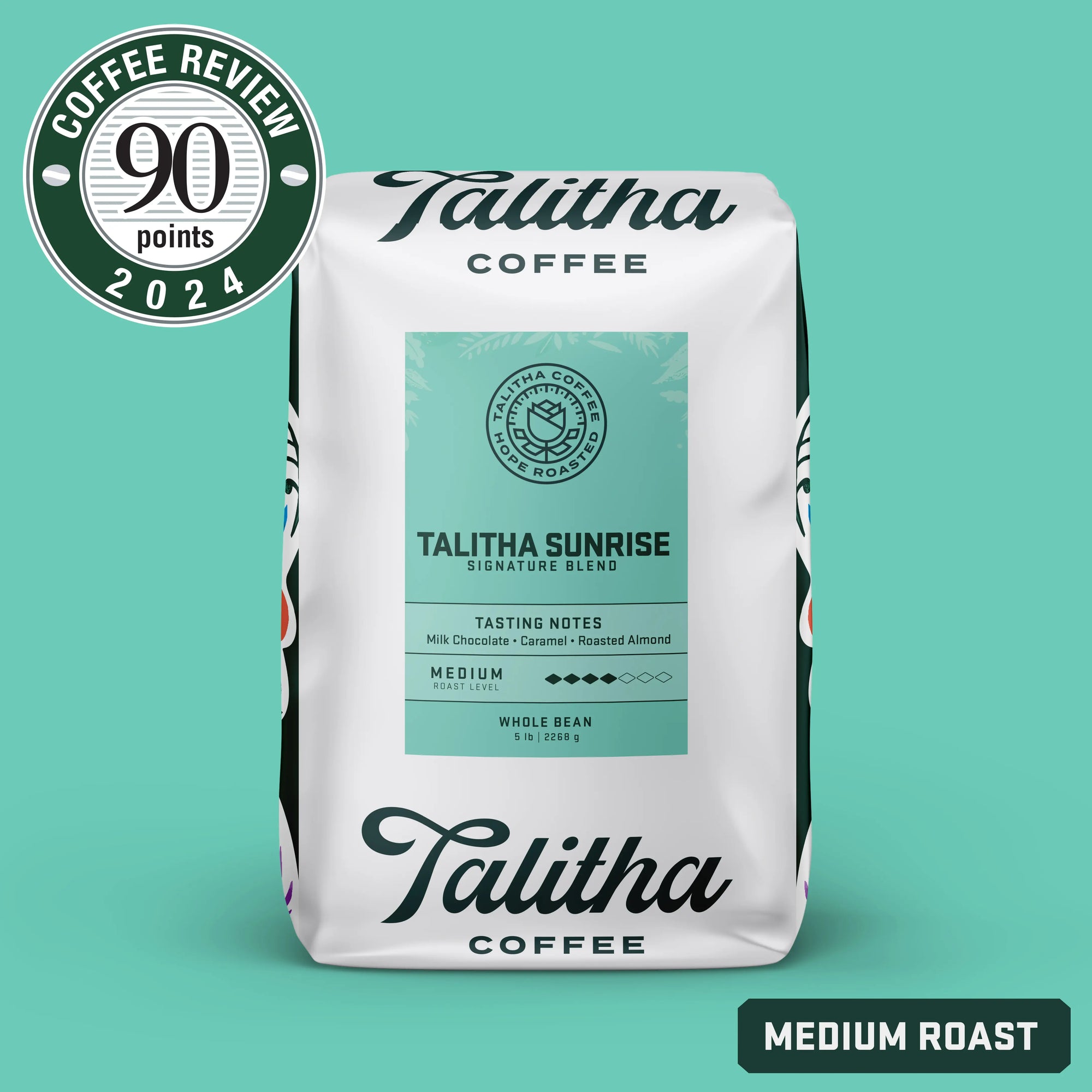 Packaging for Talitha Sunrise coffee with a medium roast designation and a score of 90 points from Coffee Review 2024. The bag features a colorful floral design and provides information about the coffee blend.